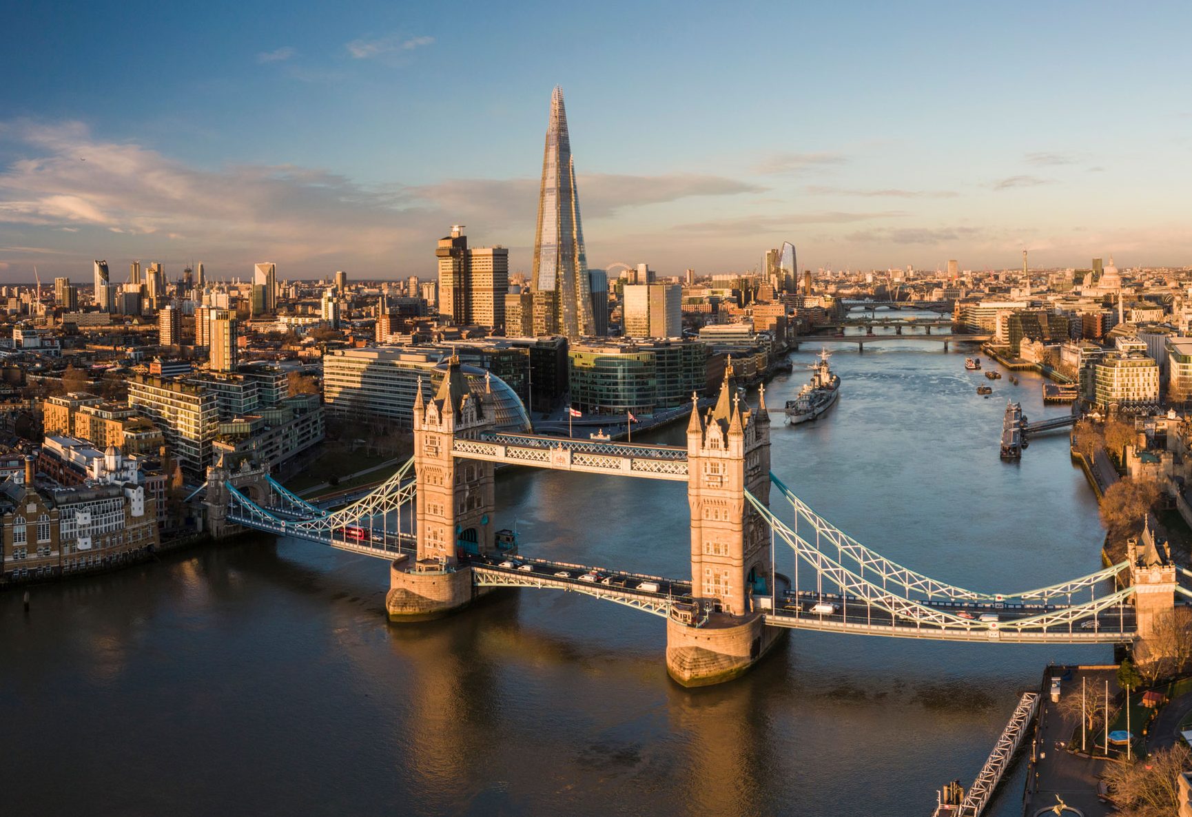 UK, London, Aerial view of Tower Bridge over River Thames at sunset